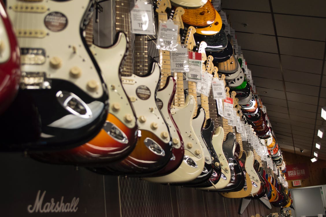Electric Guitars Hanging in Store