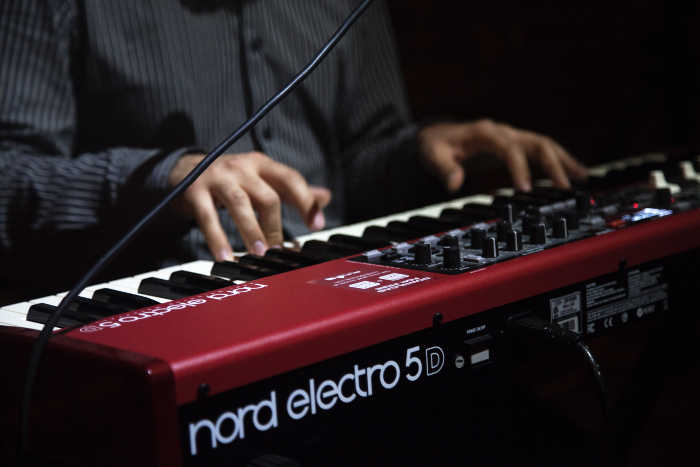 Man Playing Nord Digital Piano